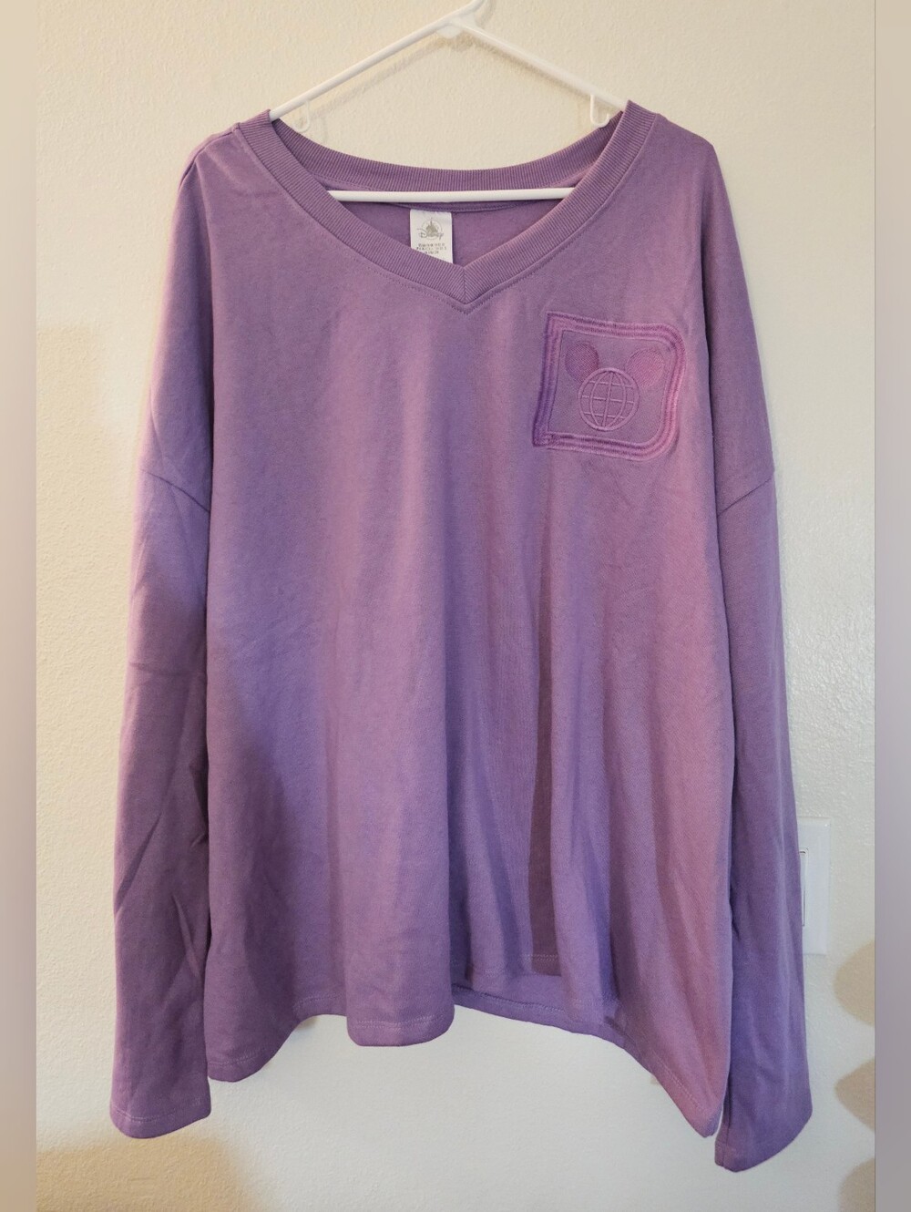 NWOT Disney Parks Purple Embossed Mickey Globe V-Neck Pullover Sweatshirt 1X